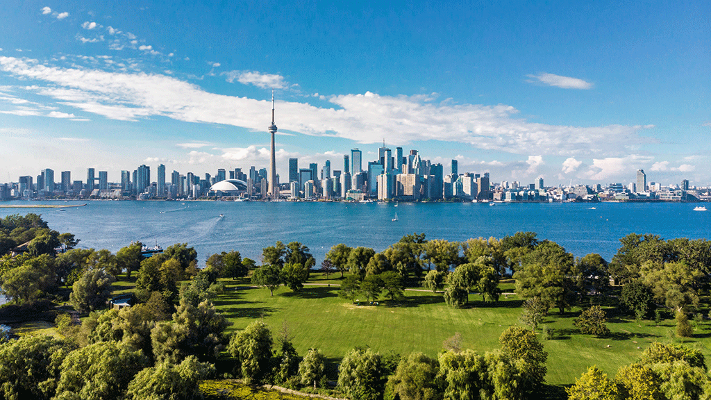 Wide angle view of the Toronto skyline. Toronto Island in the foreground.