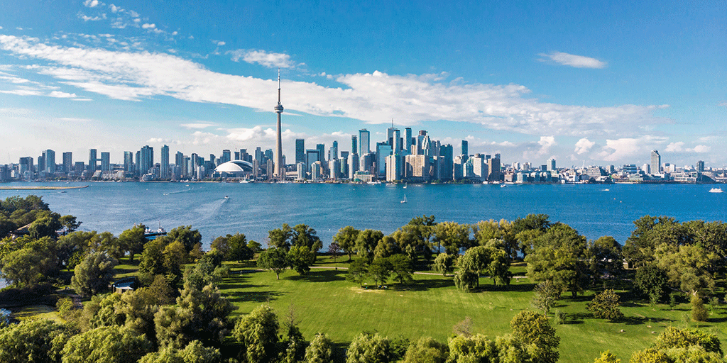 Wide angle view of the Toronto skyline. Toronto Island in the foreground.